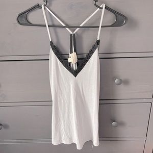 Caution to the wind flowy tank top